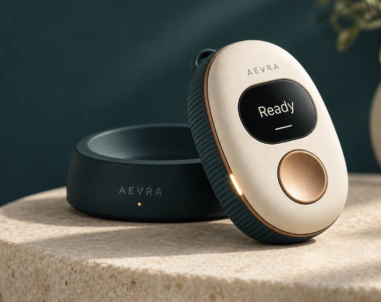 The copper button and the small screen showing the word Ready.